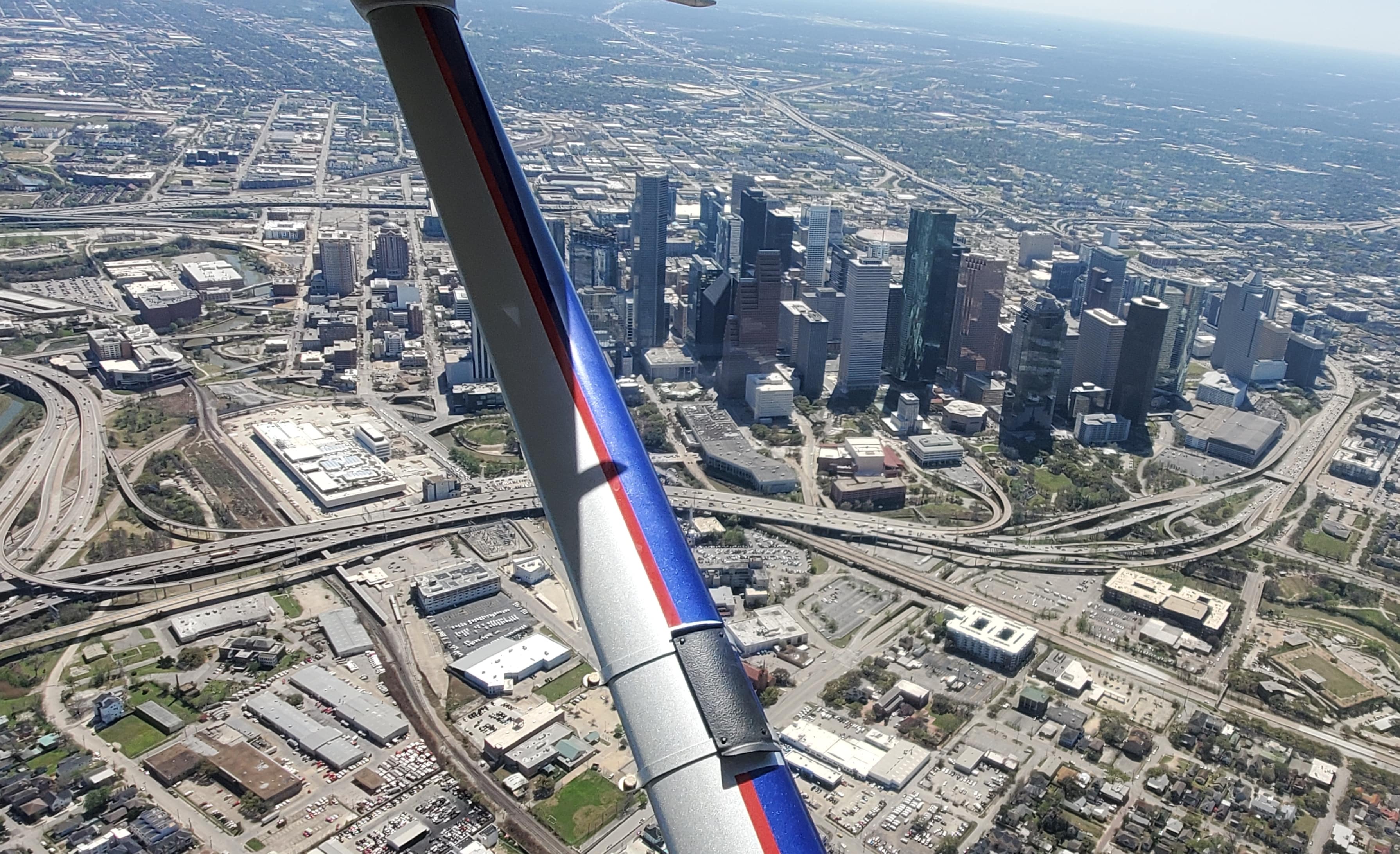 Cross-country flight overlooking downtown Houston.